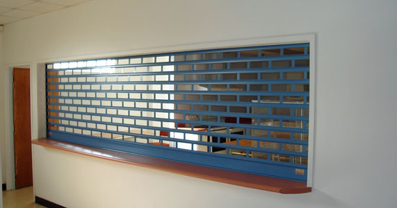 punched Shuttergrille at Sandringham Church roller after 2